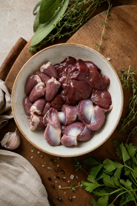 Raw duck giblets including heart and liver for dogs, a concentrated organ meat source